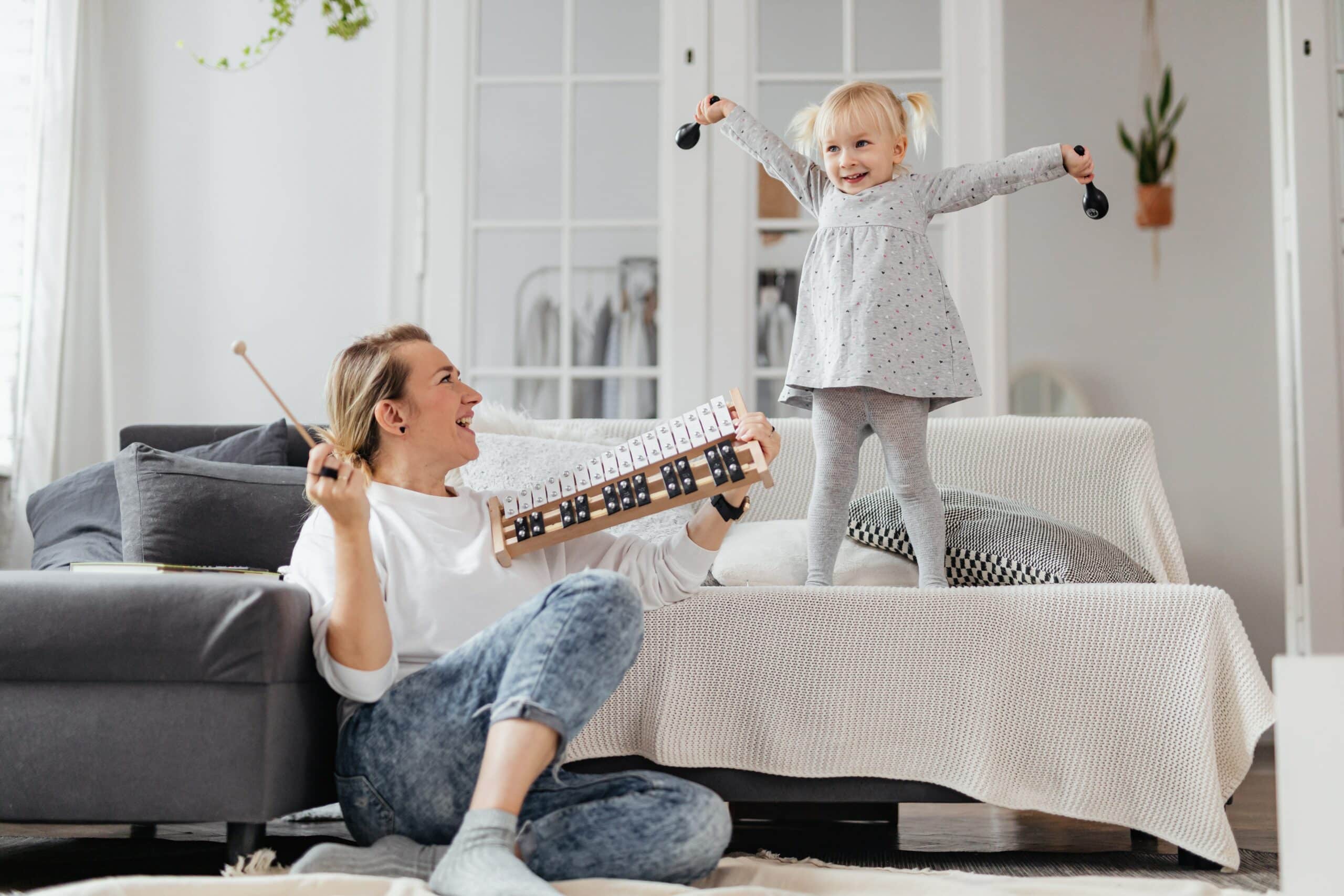 Children who engage in music and dance sessions guided by their nannies express themselves creatively and develop rhythm