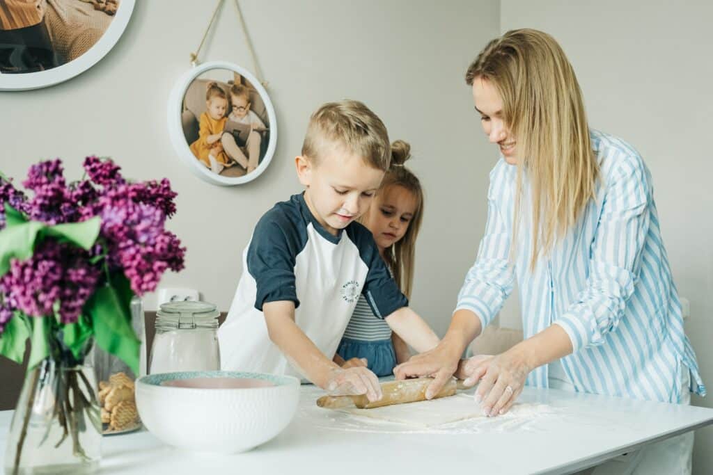 Children who participate in cooking and baking activities with their nannies learn about math, measurements, and healthy eating habits